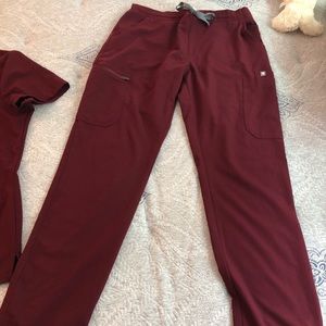 A burgundy women’s FIGS set - technical collection